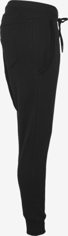 Tapered Pantaloni di Urban Classics in nero