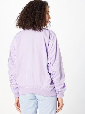 Moves Between-season jacket in Purple