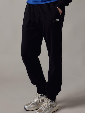 Pantalon 'Joggers Felpati' OWN Off With Nature en noir