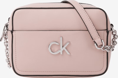 Rankinė su ilgu dirželiu iš Calvin Klein, spalva – rožių spalva, Prekių apžvalga