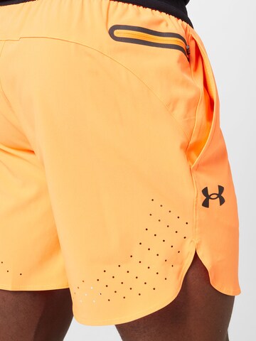 Regular Pantalon de sport 'Peak' UNDER ARMOUR en orange