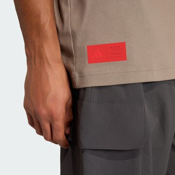 T-Shirt fonctionnel 'Audi Revolut F1 Team Elevated II' ADIDAS PERFORMANCE en marron