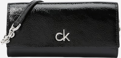 Calvin Klein Rahakott must, Tootevaade
