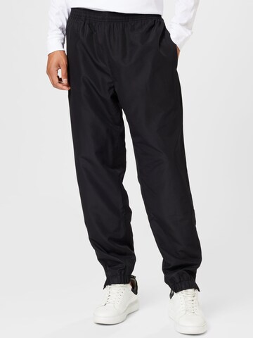 Lacoste Sport Tapered Workout Pants in Black: front