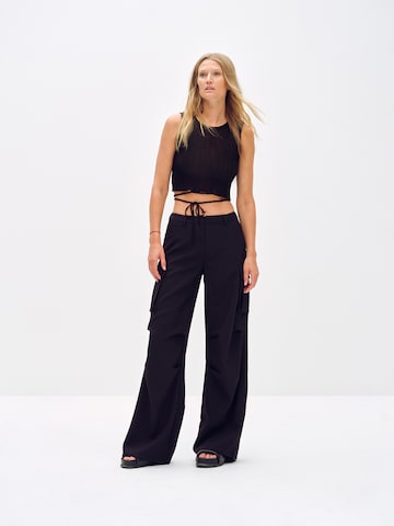 ABOUT YOU x Toni Garrn Loose fit Cargo Pants 'Dakota' in Black