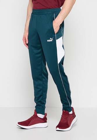 Effilé Pantalon de sport PUMA en vert : sur le côté