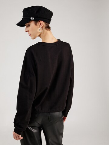 Sweat-shirt 'Cathleen' ABOUT YOU en noir