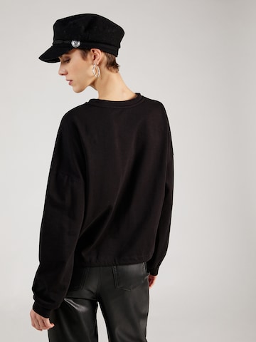 ABOUT YOU Sweatshirt 'Cathleen' in Zwart