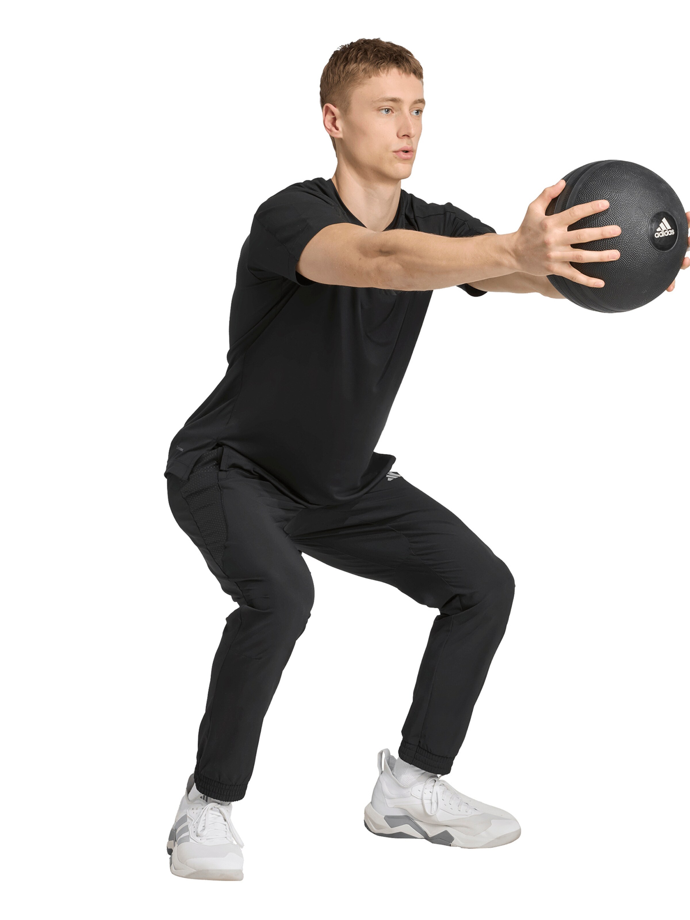 Tapered Pantaloni sportivi 'Tech Apparel' di ADIDAS PERFORMANCE in nero