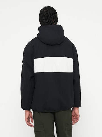 Nike Sportswear Přechodná bunda 'AIR' – černá
