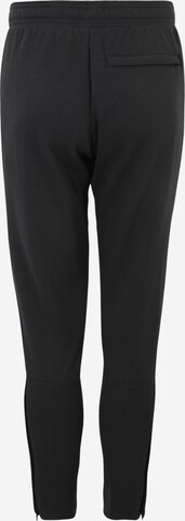 ADIDAS SPORTSWEAR Tapered Workout Pants 'Germany Lifestyler' in Black