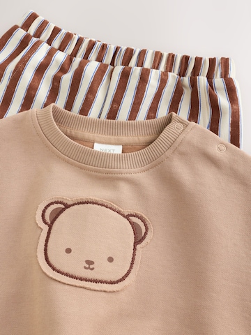 Set Next en marron