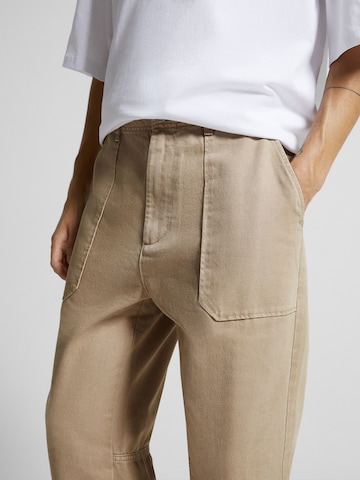Bershka Lużny krój Spodnie w kolorze brązowy
