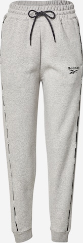 Reebok - Tapered Calças de desporto em cinzento: frente