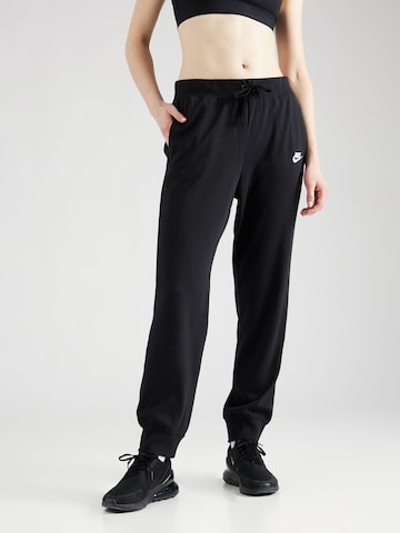 Nike Sportswear Tapered Trousers in Black: front