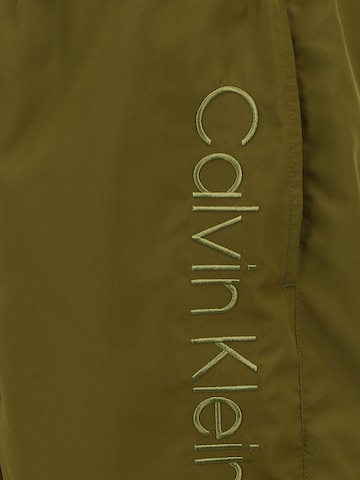 Calvin Klein Swimwear Plavecké šortky – zelená