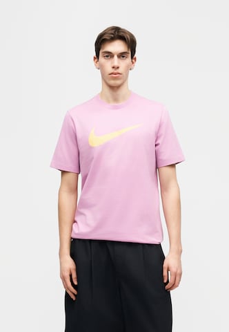 T-Shirt 'Swoosh' Nike Sportswear en rose : devant
