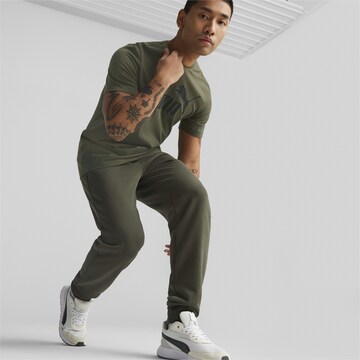 Effilé Pantalon de sport PUMA en vert