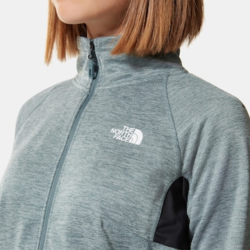 THE NORTH FACE Спортна жилетка с качулка в синьо