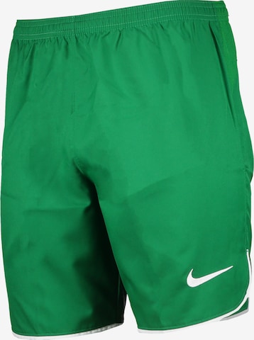 NIKE Regular Workout Pants in Green: front