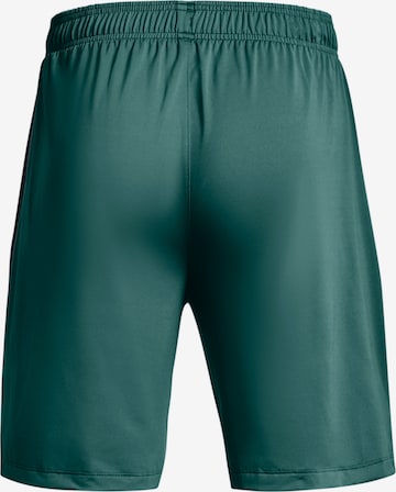 UNDER ARMOUR Regular Athletic Pants in Green