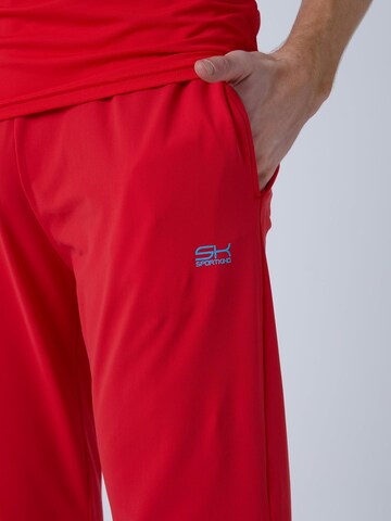 Coupe slim Pantalon de sport 'Slim Training Pants' SPORTKIND en rouge