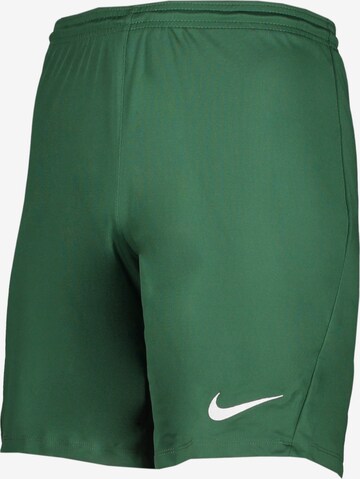 NIKE Regular Workout Pants in Green: front