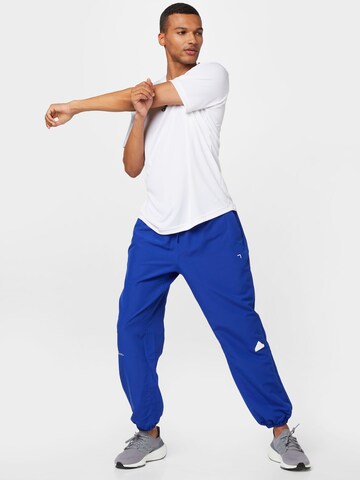 ADIDAS SPORTSWEAR - Tapered Pantalón deportivo en azul