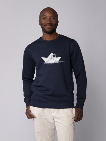 Watapparel Sweatshirt ' Astronaut in paper boat ' in Blauw: voorkant