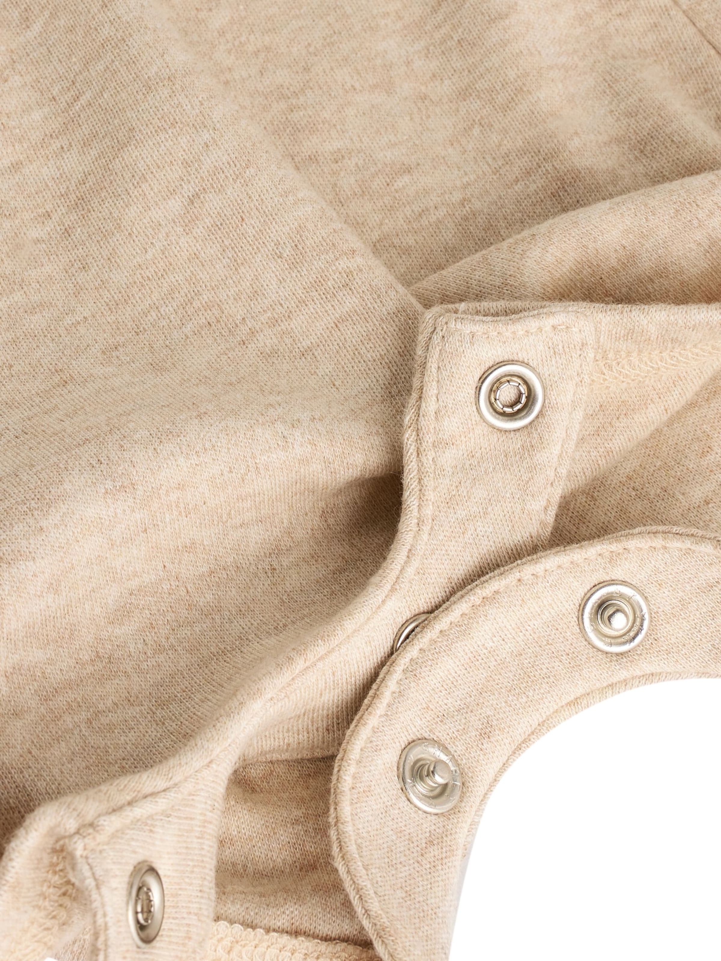 Tutina / body per bambino di Next in beige