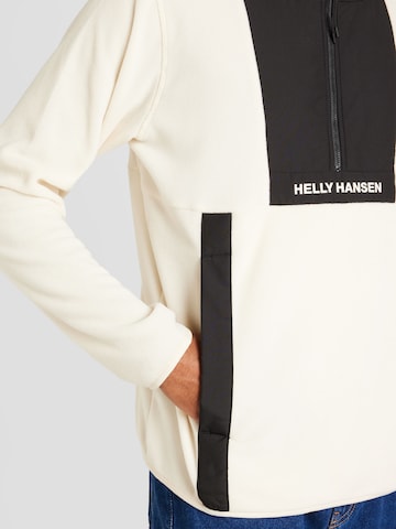HELLY HANSEN - Jersey en beige