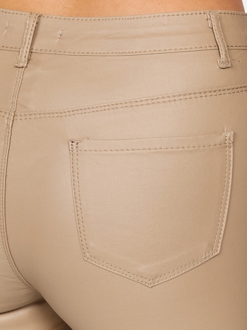 Elara Skinny Jeans i brun