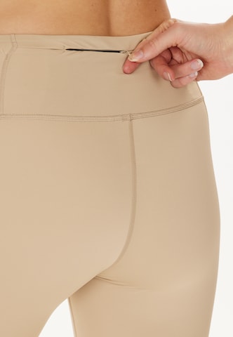 ENDURANCE Skinny Urheiluhousut 'Thadea' värissä beige