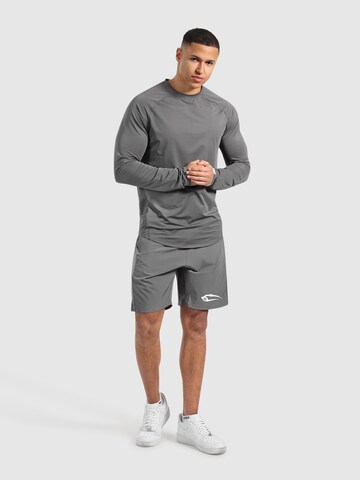 T-Shirt ' Powerfit ' Smilodox en gris
