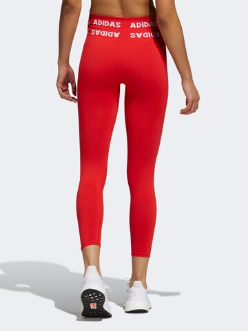 ADIDAS SPORTSWEAR - Skinny Calças de desporto em vermelho