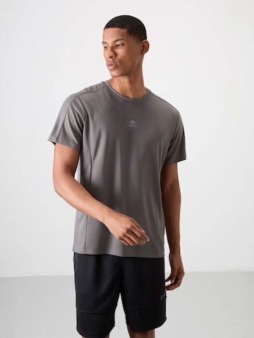 T-Shirt fonctionnel 'T-Shirts' Tommy Life en gris