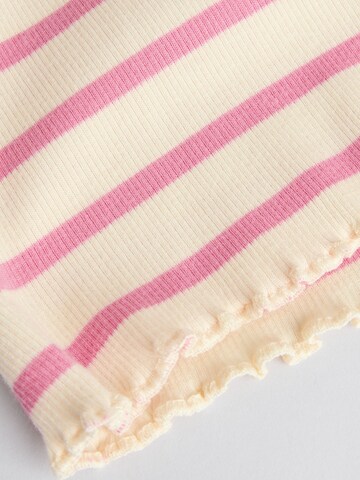 Set Next en rose