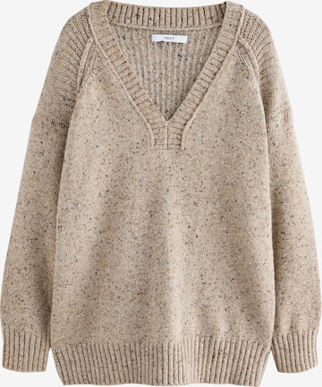 Pulovere dimensiuni mari de la Next pe bej: față