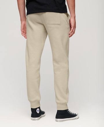 Superdry Tapered Pants 'ESSENTIAL' in Beige