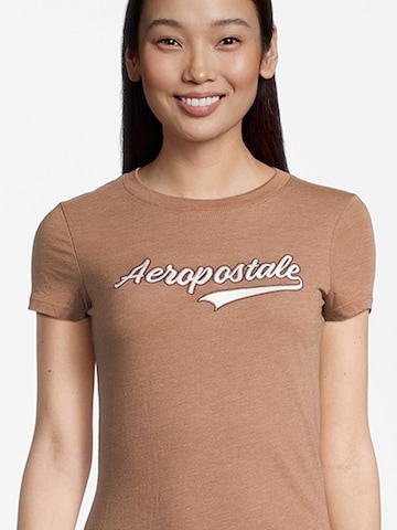 AÉROPOSTALE T-shirt 'JKI SCRIPT TAIL' i beige