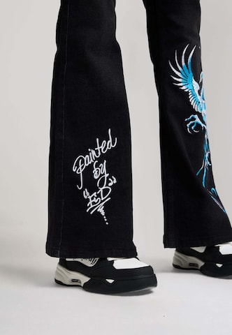 Ed Hardy Lużny krój Jeansy 'Rising Phoenix' w kolorze czarny