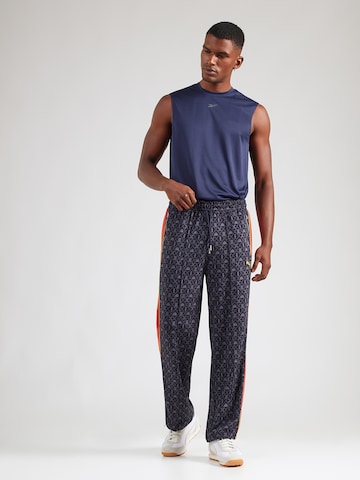 PUMA Loosefit Παντελόνι φόρμας 'Road To Unity' σε μπλε