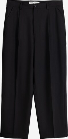 Bershka Loose fit Pleat-front trousers in Black: front