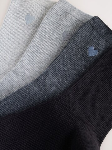 Next Sockor i grå