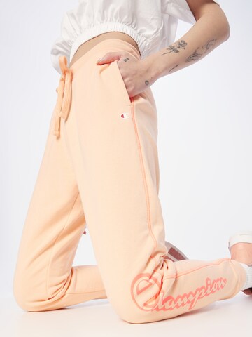 Champion Authentic Athletic Apparel Tapered Broek in Roze