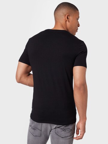 GUESS T-Shirt in Schwarz