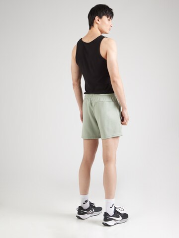 NIKE Regular Sports trousers 'PRIMARY' in Green