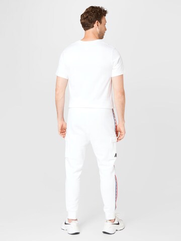 Nike Sportswear tavaline Klapptaskutega püksid, värv valge
