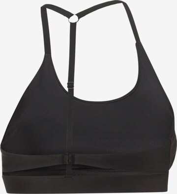 PUMA Bustier Sports-BH i svart