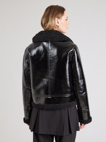 GUESS Tussenjas 'LS ANDREA FAUX SHEARLING JKT' in Zwart